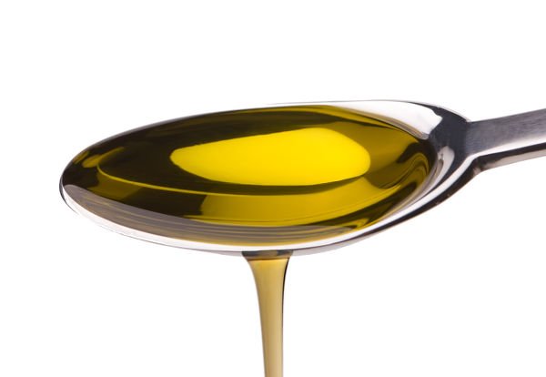 Dos cucharadas soperas de aceite de oliva como máximo
